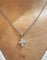 Collier Collier pendentif croix en or blanc 18 carats et diamants 58 Facettes