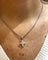 Collier Collier pendentif croix en or blanc 18 carats et diamants 58 Facettes