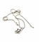 Collier Collier pendentif croix en or blanc 18 carats et diamants 58 Facettes