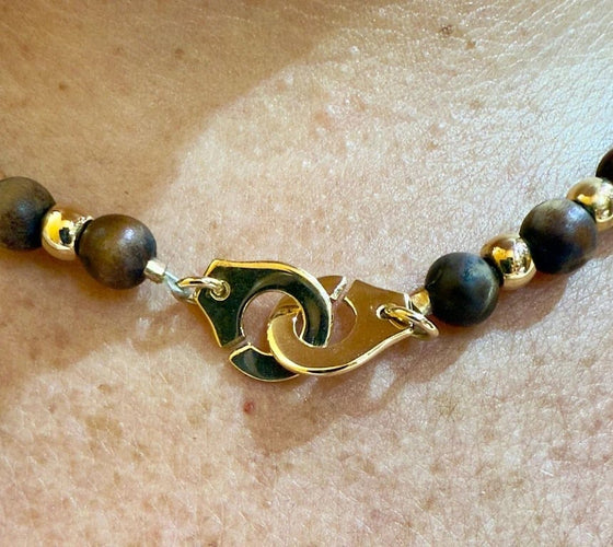 Collier Dinh Van - Collier en or jaune 18 carats et boules en bois 58 Facettes