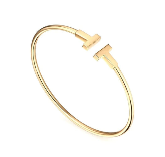 Bracelet Tiffany & Co T-Wire - Bracelet jonc en or jaune 18 carats 58 Facettes