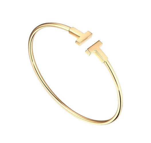 Bracelet Tiffany & Co T-Wire - Bracelet jonc en or jaune 18 carats 58 Facettes