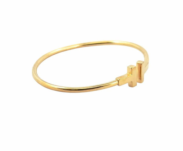 Bracelet Tiffany & Co T-Wire - Bracelet jonc en or jaune 18 carats 58 Facettes