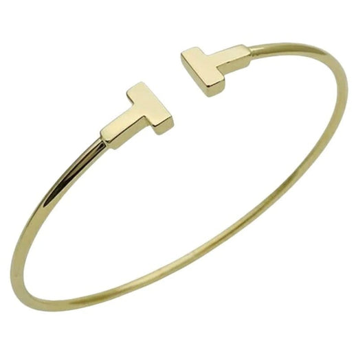 Bracelet Tiffany & Co T-Wire - Bracelet jonc en or jaune 18 carats 58 Facettes