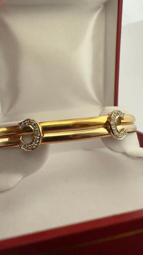 Bracelet Cartier - Bracelet jonc Double C en or jaune et blanc et diamants 58 Facettes