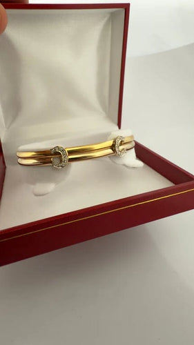Bracelet Cartier - Bracelet jonc Double C en or jaune et blanc et diamants 58 Facettes