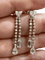 Boucles d'oreilles Boucles d'oreilles pendantes en or blanc 18 carats et diamants naturels 58 Facettes