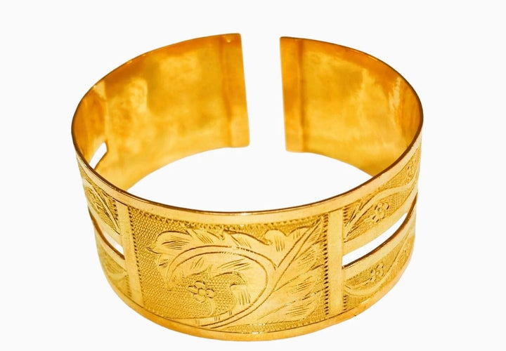 Bracelet Bracelet manchette rigide en or jaune 18 carats 58 Facettes RA-73/1
