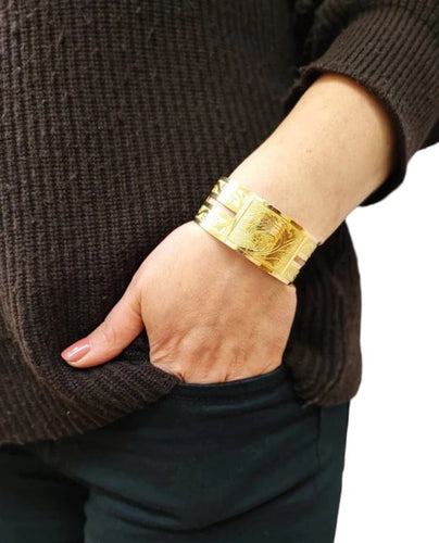 Bracelet Bracelet manchette rigide en or jaune 18 carats 58 Facettes RA-73/1