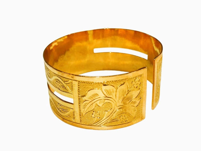 Bracelet Bracelet manchette rigide en or jaune 18 carats 58 Facettes RA-73/1