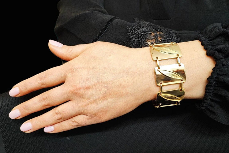 Bracelet Bracelet années 1970 en or jaune 18K 58 Facettes RA/115