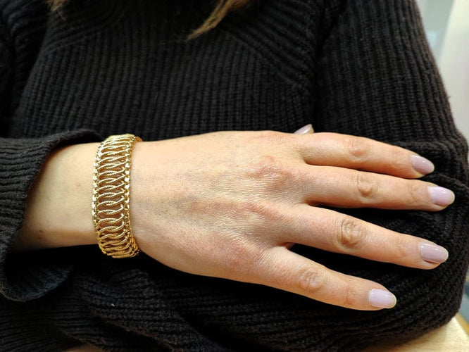 Bracelet Bracelet semi-rigide en or 18K 750‰ 58 Facettes Brac.Entrelac916