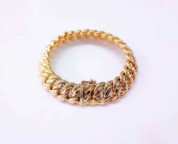 Bracelet Bracelet maille américaine en or jaune 18K 58 Facettes Bra.US.1505