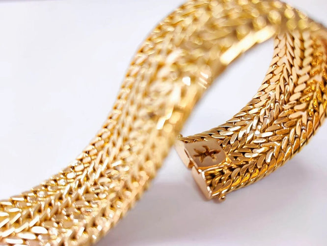 Bracelet Bracelet manchette en or jaune 18 carats 58 Facettes Brac.manch-1644