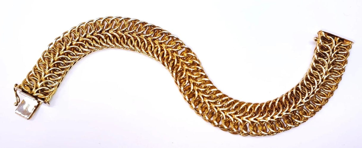 Bracelet Bracelet en or jaune 18 carats, maille anneaux entrelacés 58 Facettes BRA.sponge.263