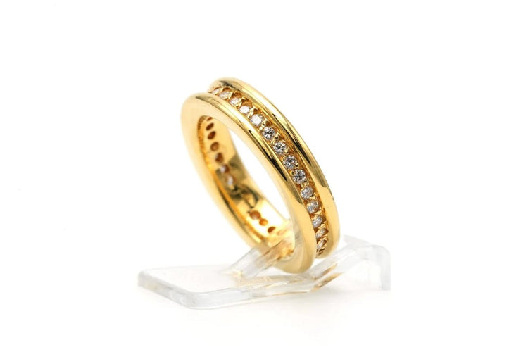 Bague 50 Bague contemporaine en or jaune 18 carats sertie de diamants 58 Facettes 23256