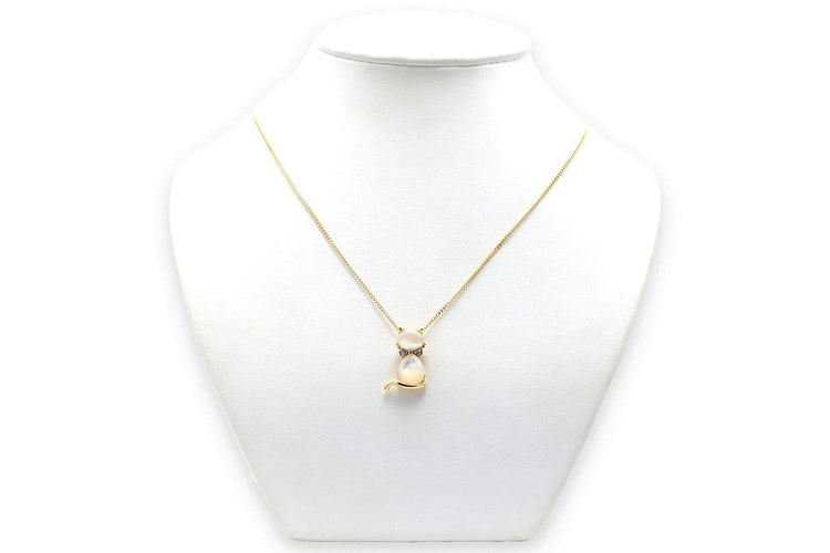Pendentif Pendentif contemporain en or jaune 14 carats, nacre et diamants 58 Facettes B800