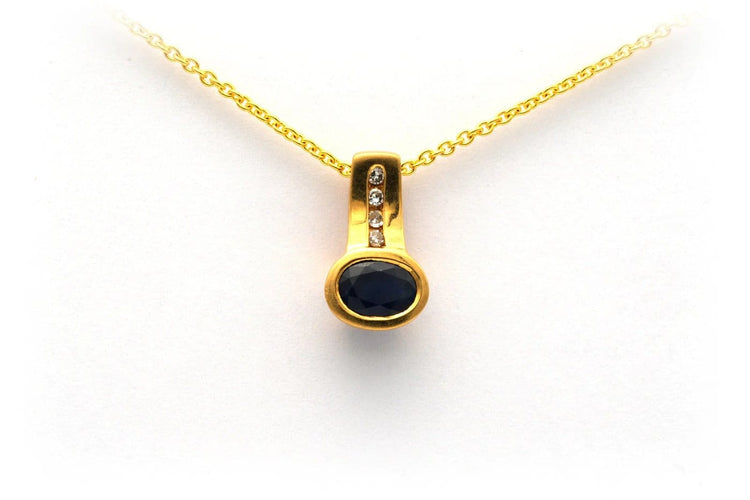 Pendentif Pendentif contemporain en or jaune, saphir et diamants 58 Facettes 23057