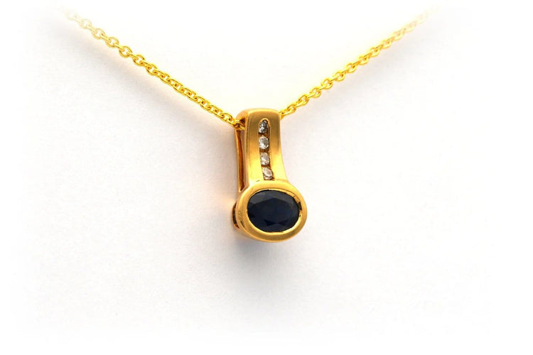 Pendentif Pendentif contemporain en or jaune, saphir et diamants 58 Facettes 23057