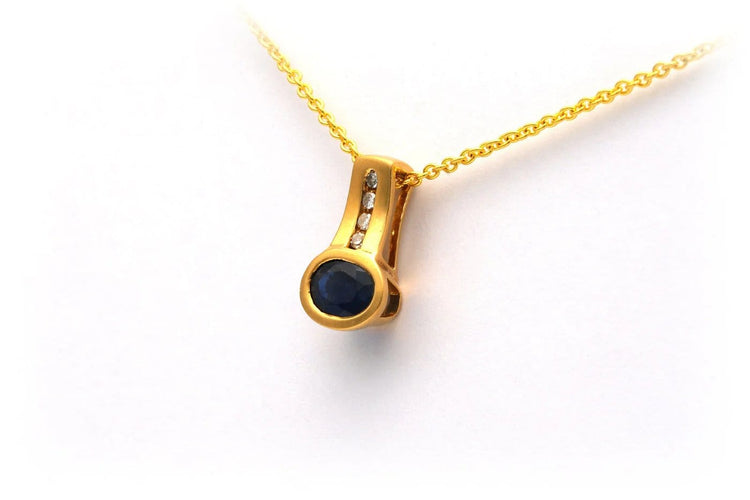 Pendentif Pendentif contemporain en or jaune, saphir et diamants 58 Facettes 23057