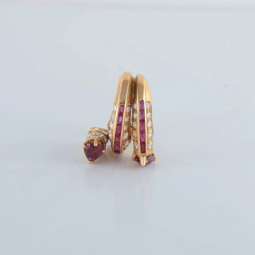 Boucles d'oreilles Boucles d’oreilles en or jaune 750 serties de rubis et diamants 58 Facettes