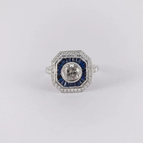 Bague 56 Bague Art déco en or blanc 18 carats, diamant et saphirs 58 Facettes