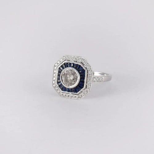 Bague 56 Bague Art déco en or blanc 18 carats, diamant et saphirs 58 Facettes