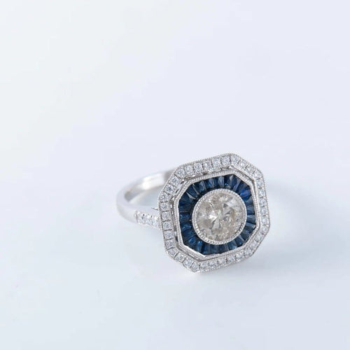 Bague 56 Bague Art déco en or blanc 18 carats, diamant et saphirs 58 Facettes