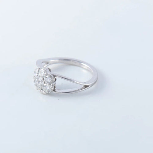 Bague 52 Bague marguerite en or blanc 750 sertie de diamants 58 Facettes