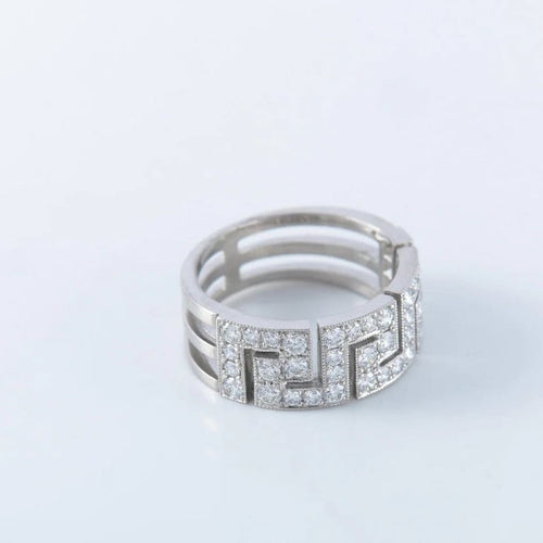 Bague 54 Bague à motifs grecs en platine et diamants 58 Facettes