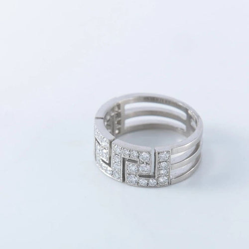 Bague 54 Bague à motifs grecs en platine et diamants 58 Facettes