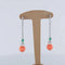 Boucles d'oreilles Boucles d'oreilles pendantes en or blanc 18 ct, émeraudes et corail godronné 58 Facettes