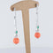 Boucles d'oreilles Boucles d'oreilles pendantes en or blanc 18 ct, émeraudes et corail godronné 58 Facettes
