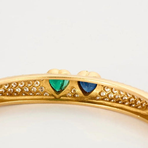 Bracelet Poiray - Bracelet jonc en or jaune 18 carats, diamants, saphir et émeraude 58 Facettes