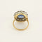 Bague 57 Bague marguerite en or blanc et or jaune, saphir 9 ct et diamants 58 Facettes