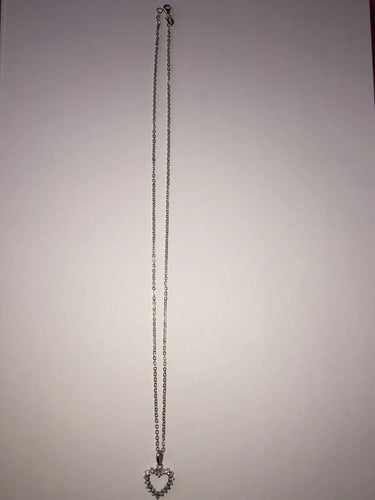 Collier Collier cœur en or blanc et diamants 58 Facettes 203
