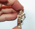 Broche Broche miniature XIXe en argent et vermeil, perles 58 Facettes 445