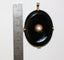 Pendentif Pendentif médaillon XIXe siècle en or jaune, onyx et perles 58 Facettes 468