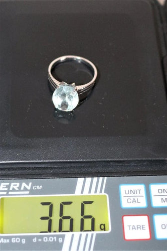 Bague 54 Bague en or blanc 18k sertie d’une aigue-marine 58 Facettes 521