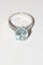 Bague 54 Bague en or blanc 18k sertie d’une aigue-marine 58 Facettes 521