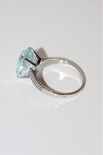 Bague 54 Bague en or blanc 18k sertie d’une aigue-marine 58 Facettes 521