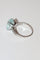Bague 54 Bague en or blanc 18k sertie d’une aigue-marine 58 Facettes 521