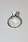 Bague 54 Bague en or blanc 18k sertie d’une aigue-marine 58 Facettes 521