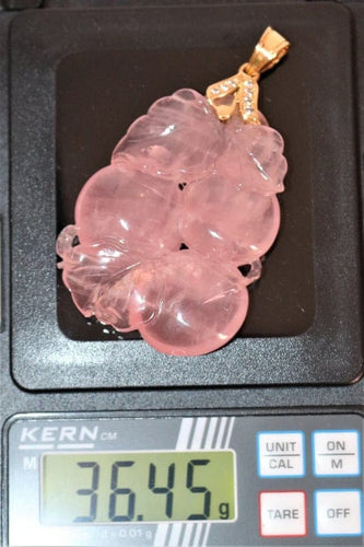 Pendentif Pendentif en quartz rose sculpté et or jaune 18 ct 58 Facettes 537