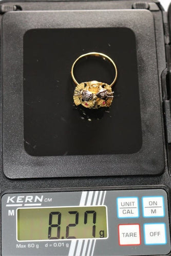Bague 60 Bague panthère en or jaune 18 carats, émail, diamants et rubis 58 Facettes 329
