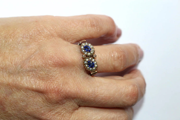 Bague 55 Bague duo ancienne en or jaune 18 carats, perles et pierres bleues 58 Facettes 573
