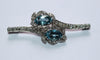 Broche Broche rétro en or gris 18 carats, aigues-marines et diamants 58 Facettes 580
