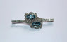Broche Broche rétro en or gris 18 carats, aigues-marines et diamants 58 Facettes 580