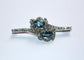 Broche Broche rétro en or gris 18 carats, aigues-marines et diamants 58 Facettes 580