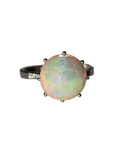 Bague 51 Bague en or blanc 18 carats avec opale et diamants 58 Facettes 585